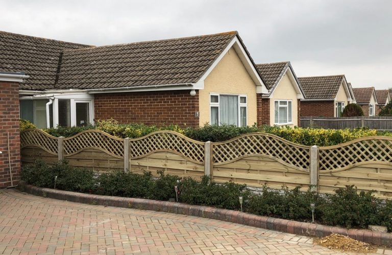 Bungalow with decorative fence supplied by Solent Fencing