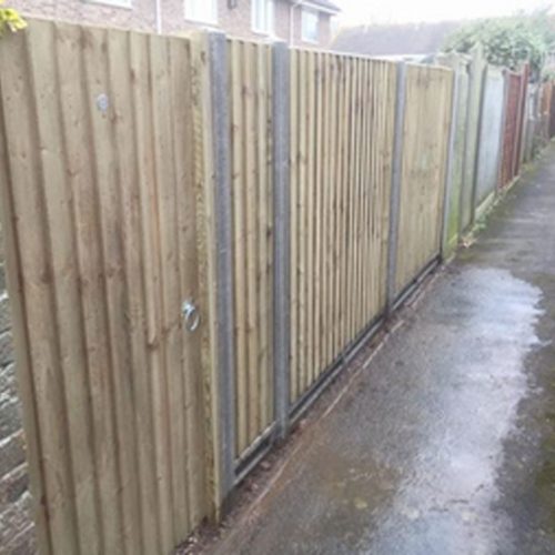 Featherboard fencing on concrete base is a strong secure fence