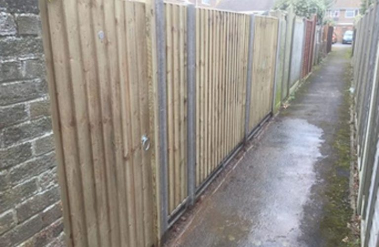Featherboard fencing on concrete base is a strong secure fence
